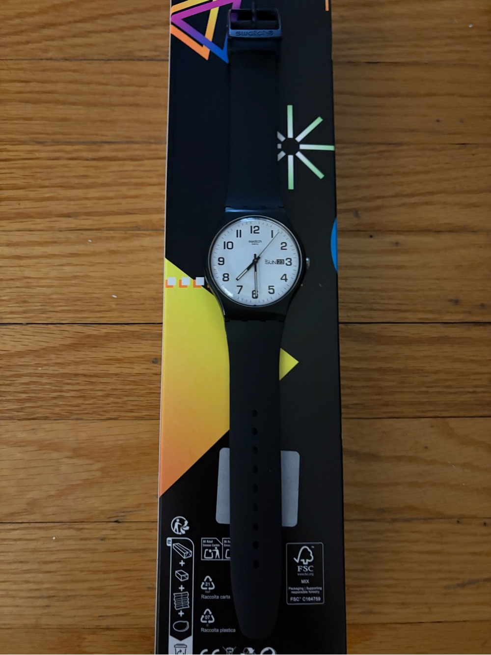 Black Swatch Silicone Strap Smartwatch with White Dial